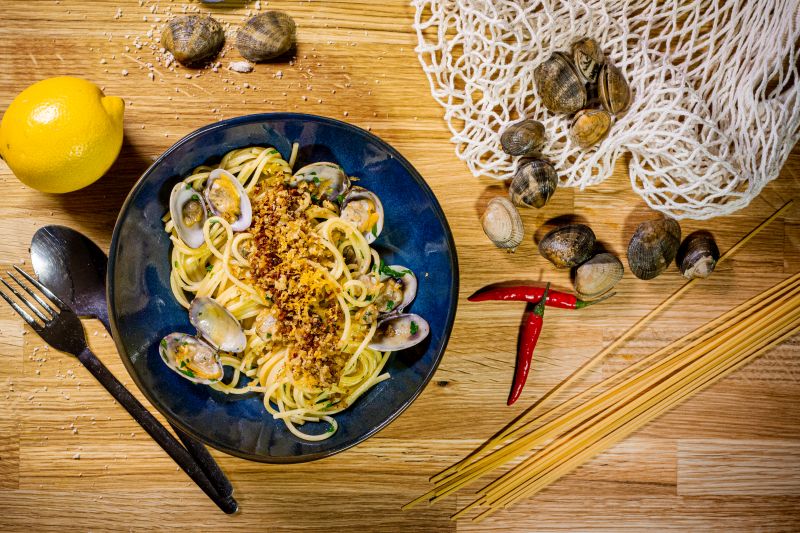 Bild zeigt einen Teller mit Spaghetti alle Vongole. Ein Rezept aus Florenz.